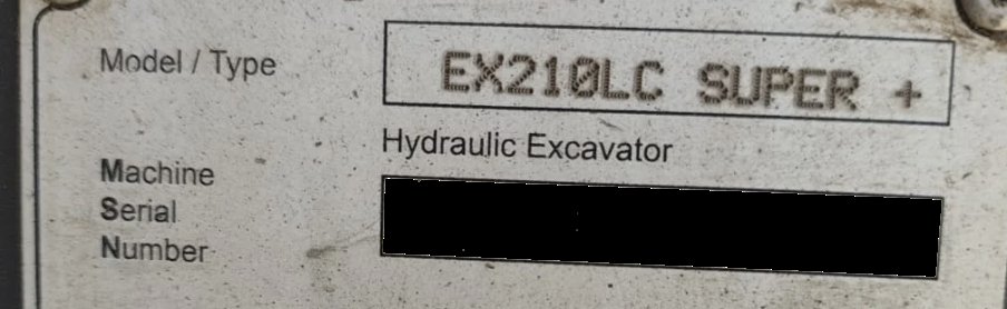 Close-up of the Model / Type and Machine Serial Number fields on a Tata Hitachi model plate